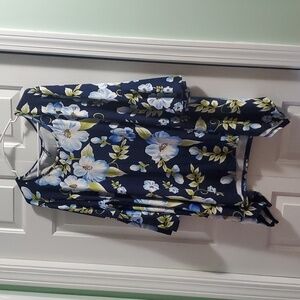 Flowered, handkerchief hem to p